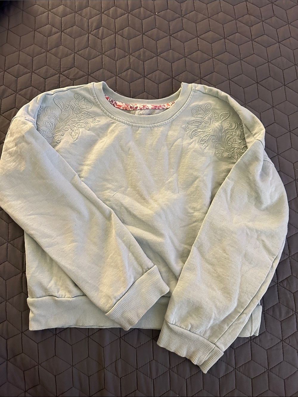 Light green girls sweatshirt with detail